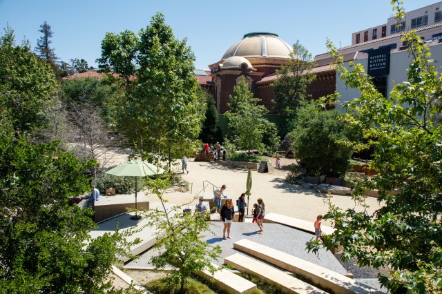 urban waterfall and 1913 building view in nature gardens