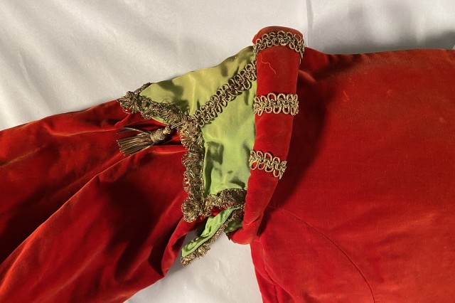 Details of red and green on a dress