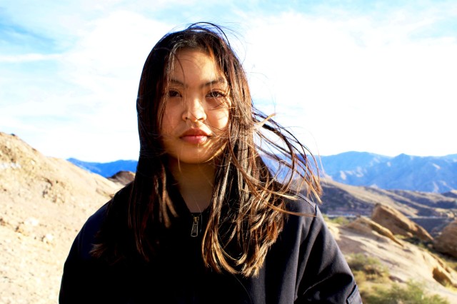 Person with mountains in background