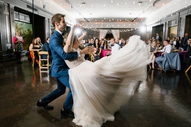 Bride and Groom dancing in the North American Mammal Hall
