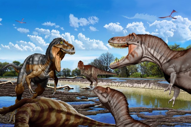 A nanotyrannus confronts two juvenile t.rex while a subadult looms in the distance
