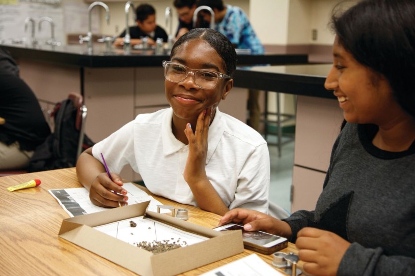 Daejah Newton, with her sorting sheet looking at fossils 