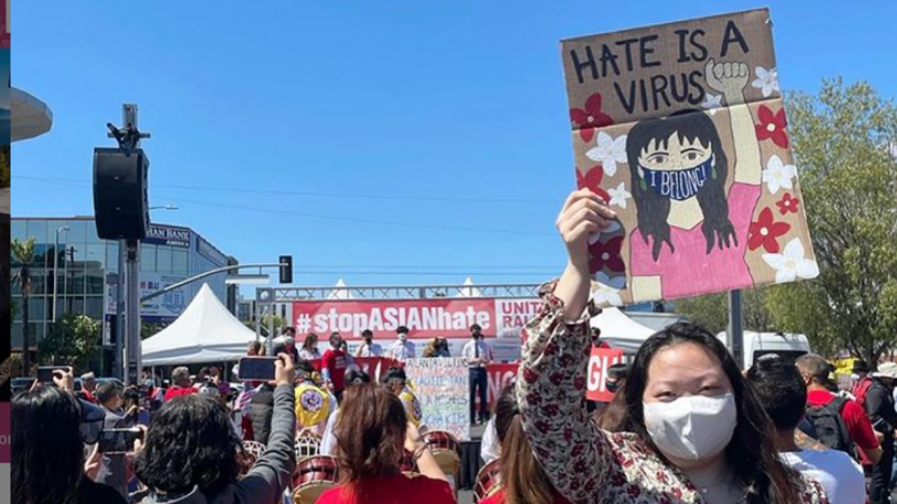 Katherine at Stop Asian Hate Rally holding sign